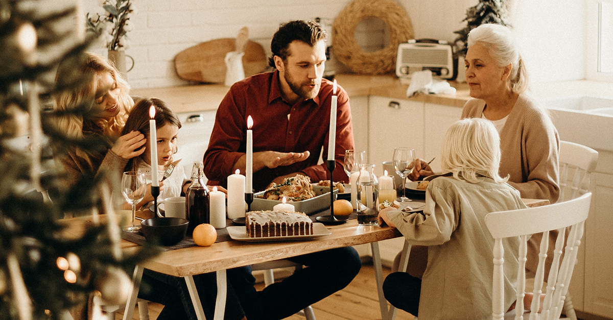 family conversing at the dinner table